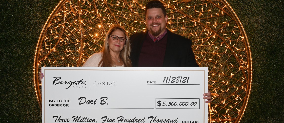 Dori B presented with her record $3.5m online jackpot win